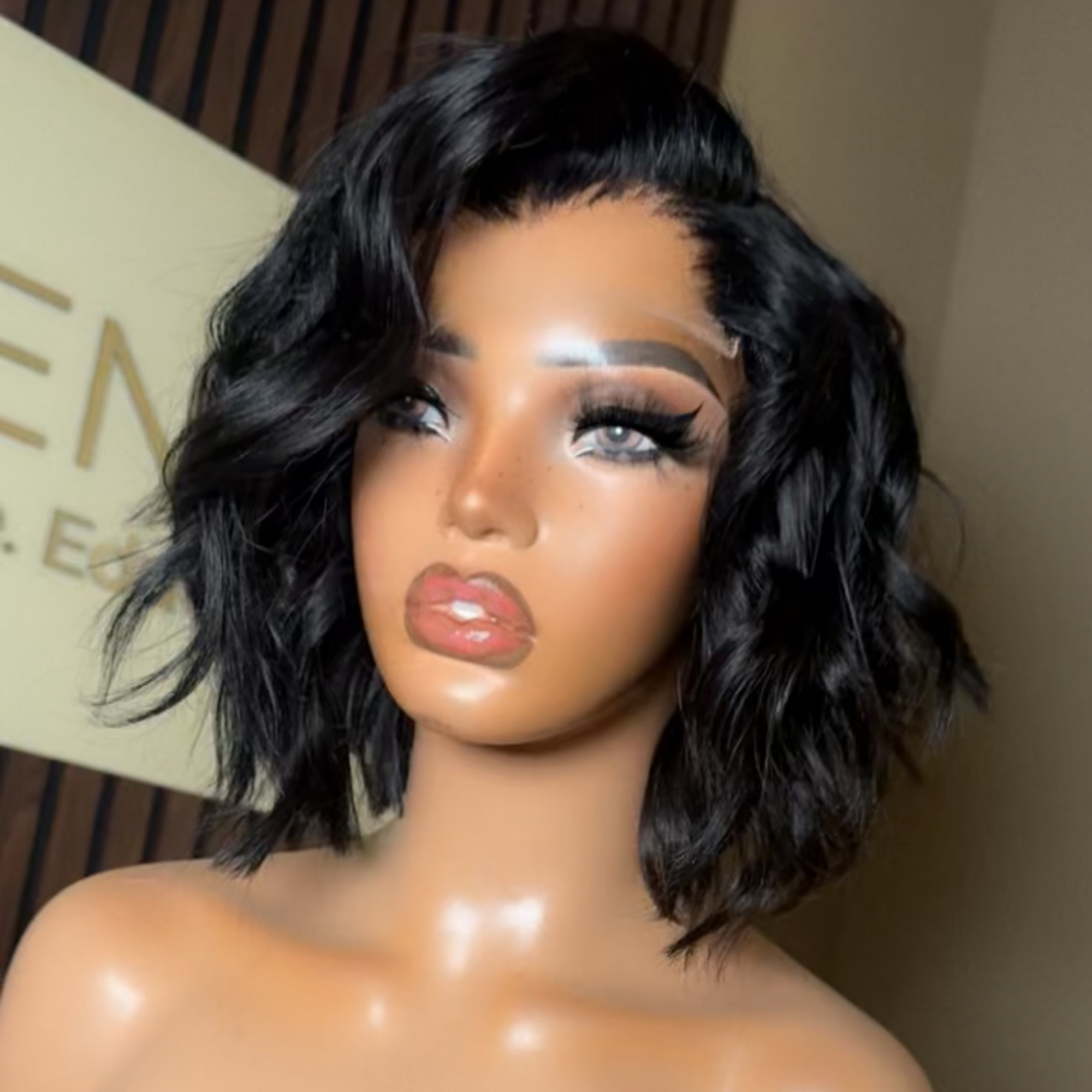 Ebony 5 x 5 HD lace raw Cambodian bob wig on display, precision cut and fully customized, ready to wear by Coco Kendyll