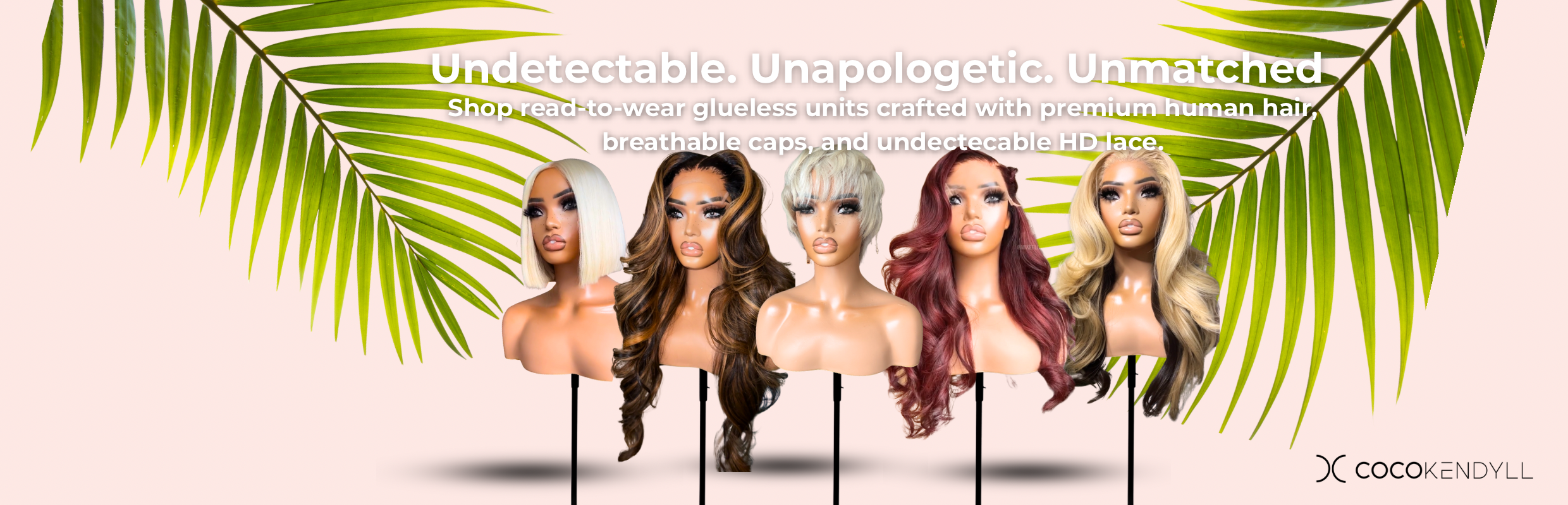 Six glueless human hair wigs on mannequins with various textures and colors, set against a prink background with palm leaves and the text "Slay Without the Salon.' from Coco Kendyll."
