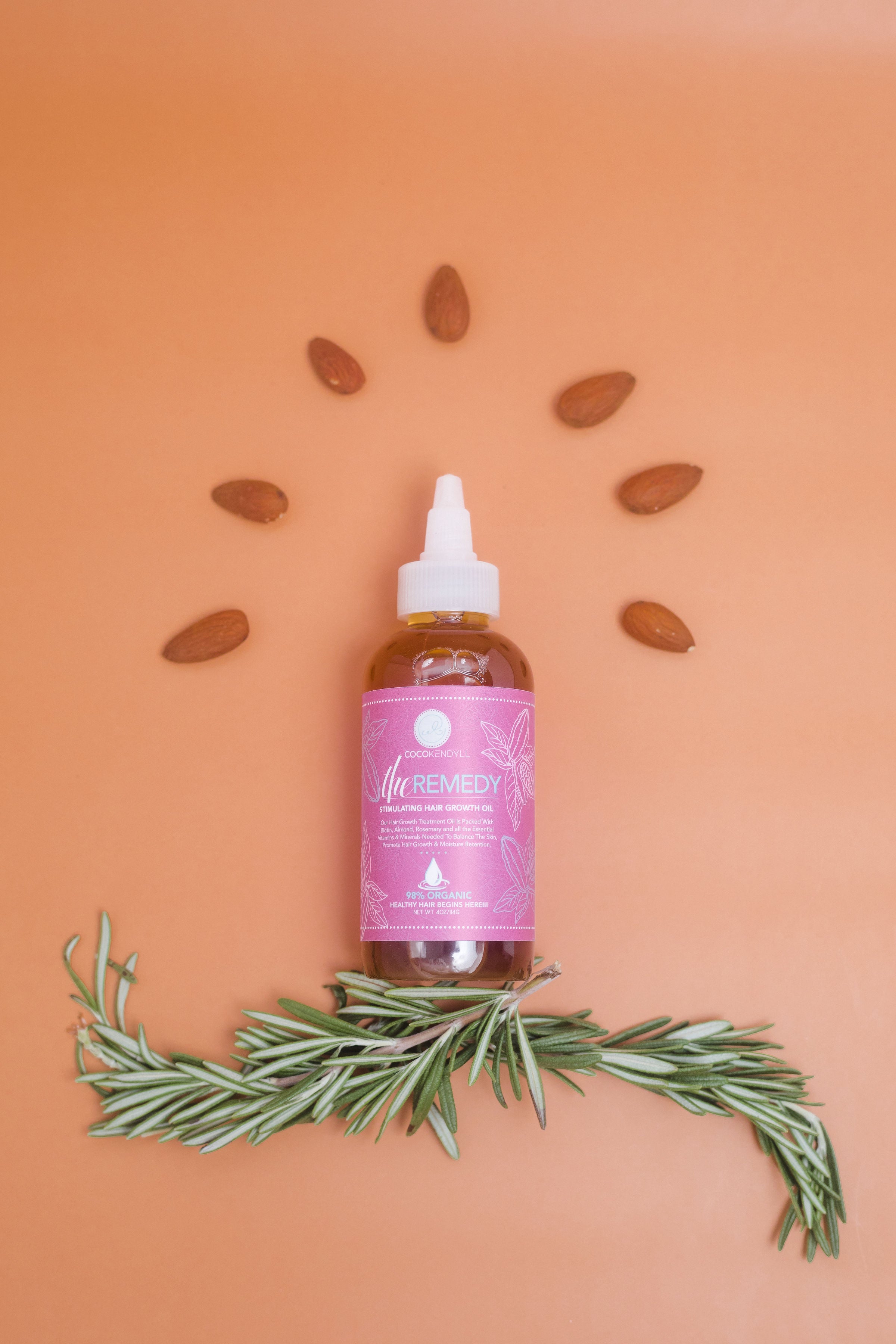 Enriched with Biotin, Rosemary, and Almond Oil, The Remedy is the perfect weapon in your hair care routine to defeat sparse edges, dry scalp, and dull hair!